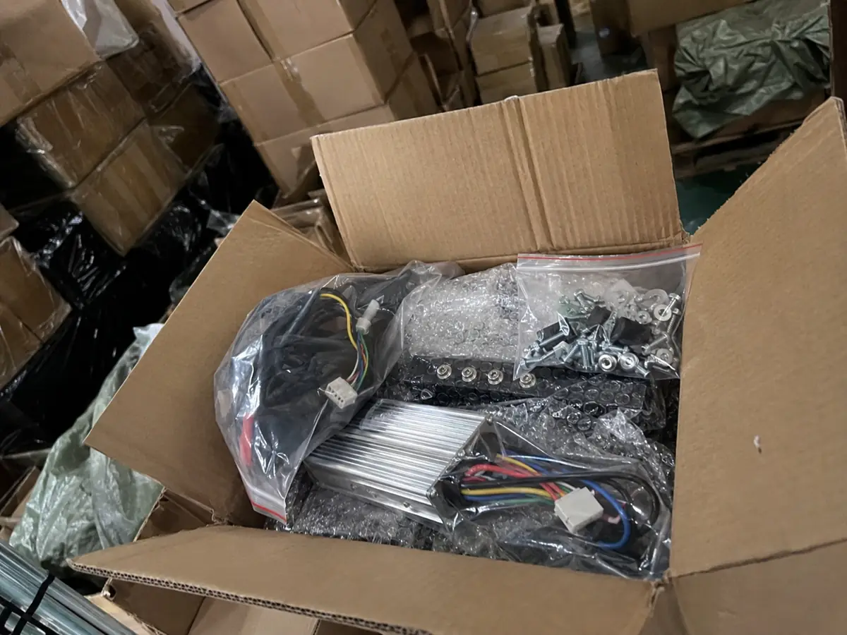 E-bike controller and accessory cartons checked before shipment